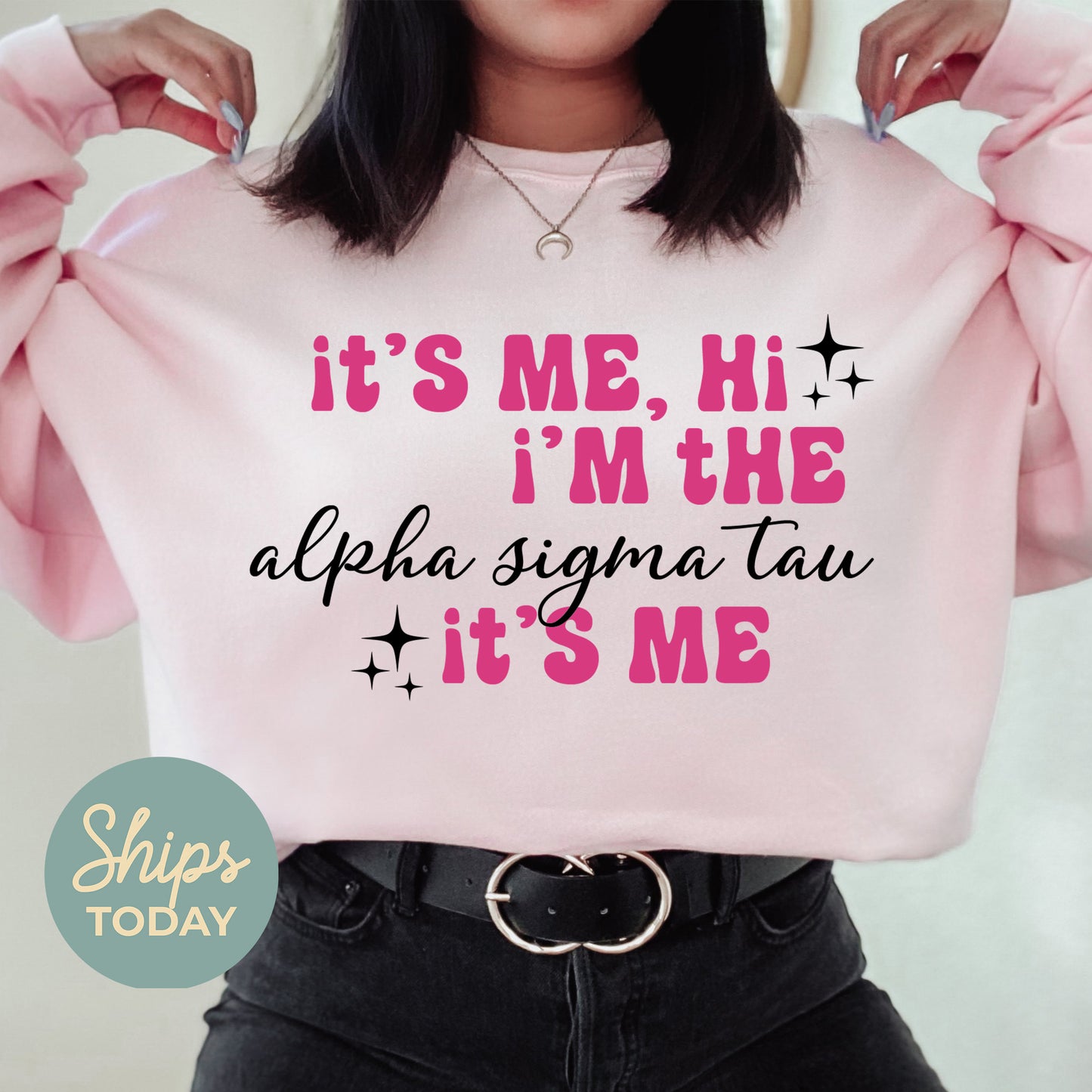 a woman wearing a pink sweatshirt that says it's me, i'm