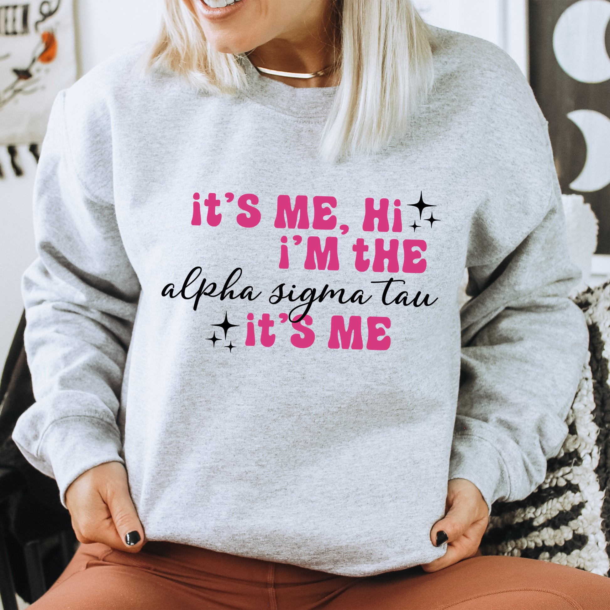 a woman wearing a sweatshirt that says it's me, i'm the