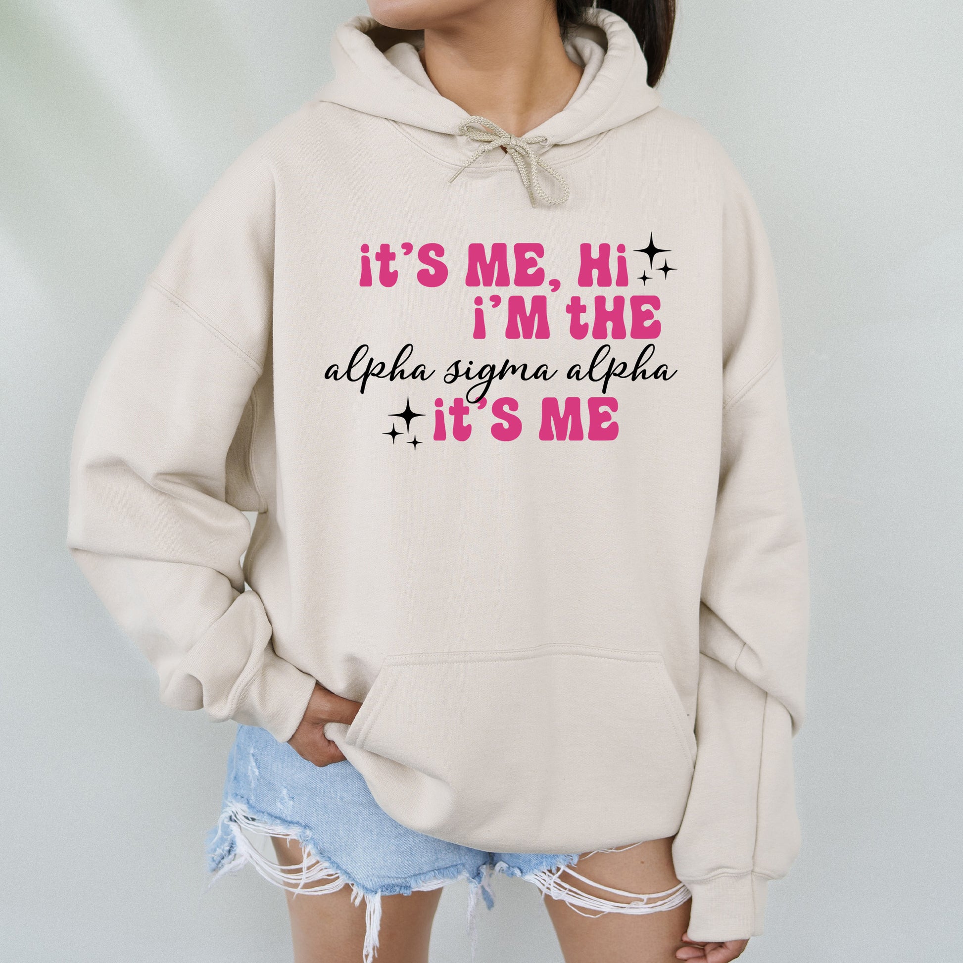 a woman wearing a sweatshirt that says it's me, i'm the