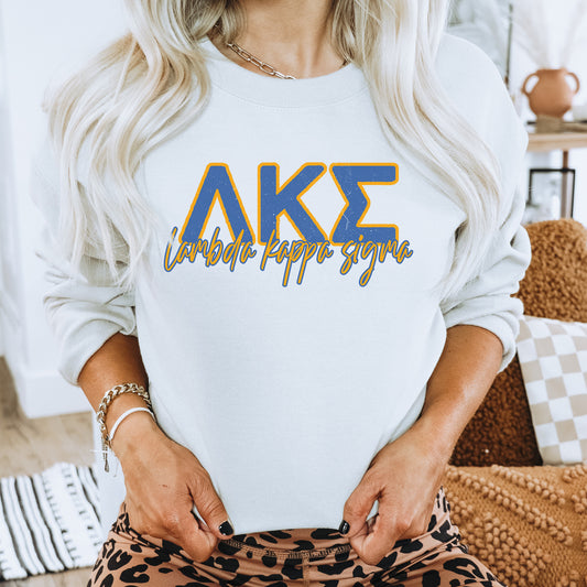 a woman with blonde hair wearing a white sweatshirt and leopard print pants