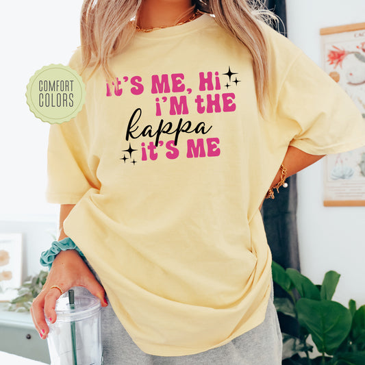 a woman wearing a yellow tshirt that says it's me, i