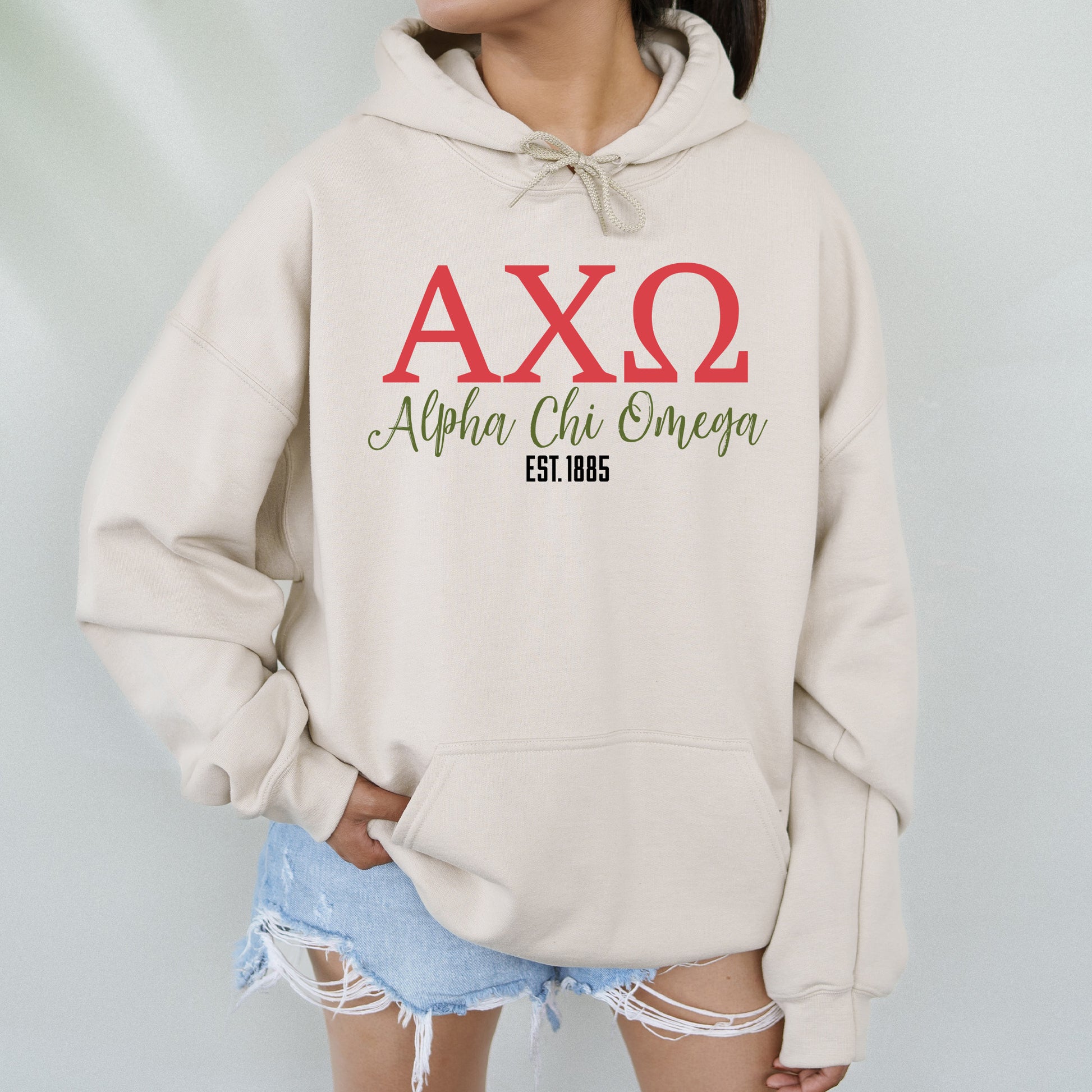 a woman wearing a hoodie with the word ax2 on it