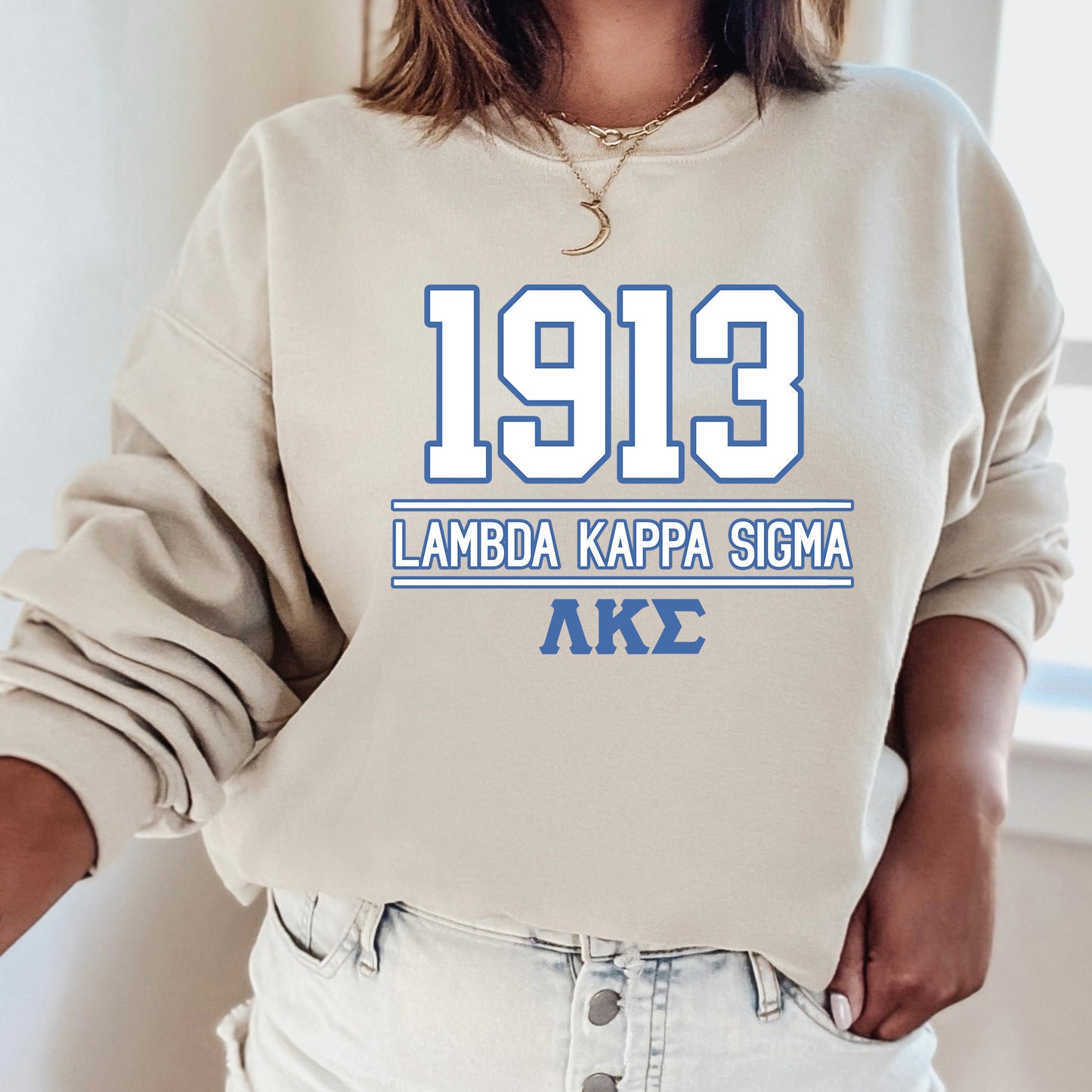 a woman wearing a sweatshirt with the number 919 printed on it