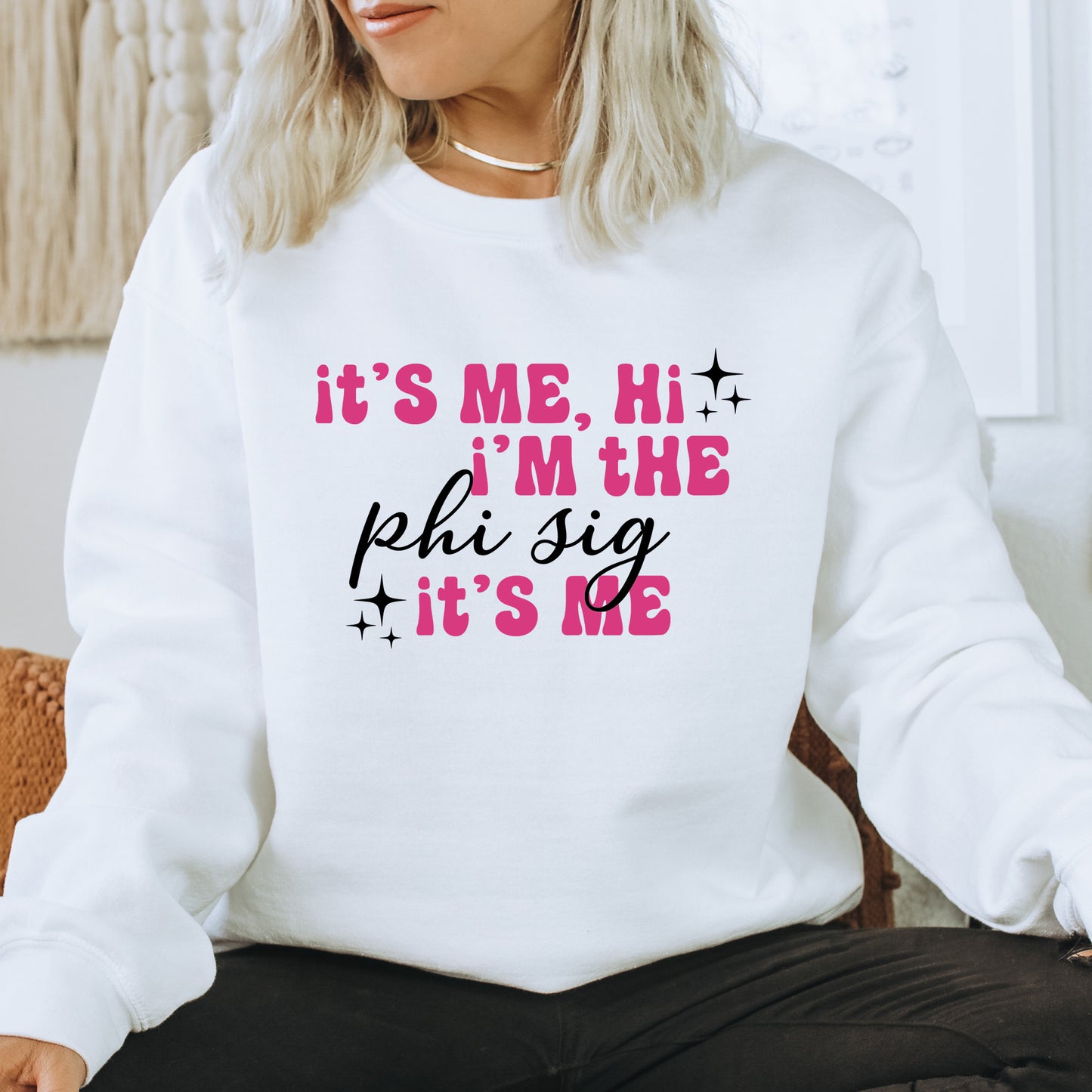 a woman wearing a sweatshirt that says it's me, i'm the