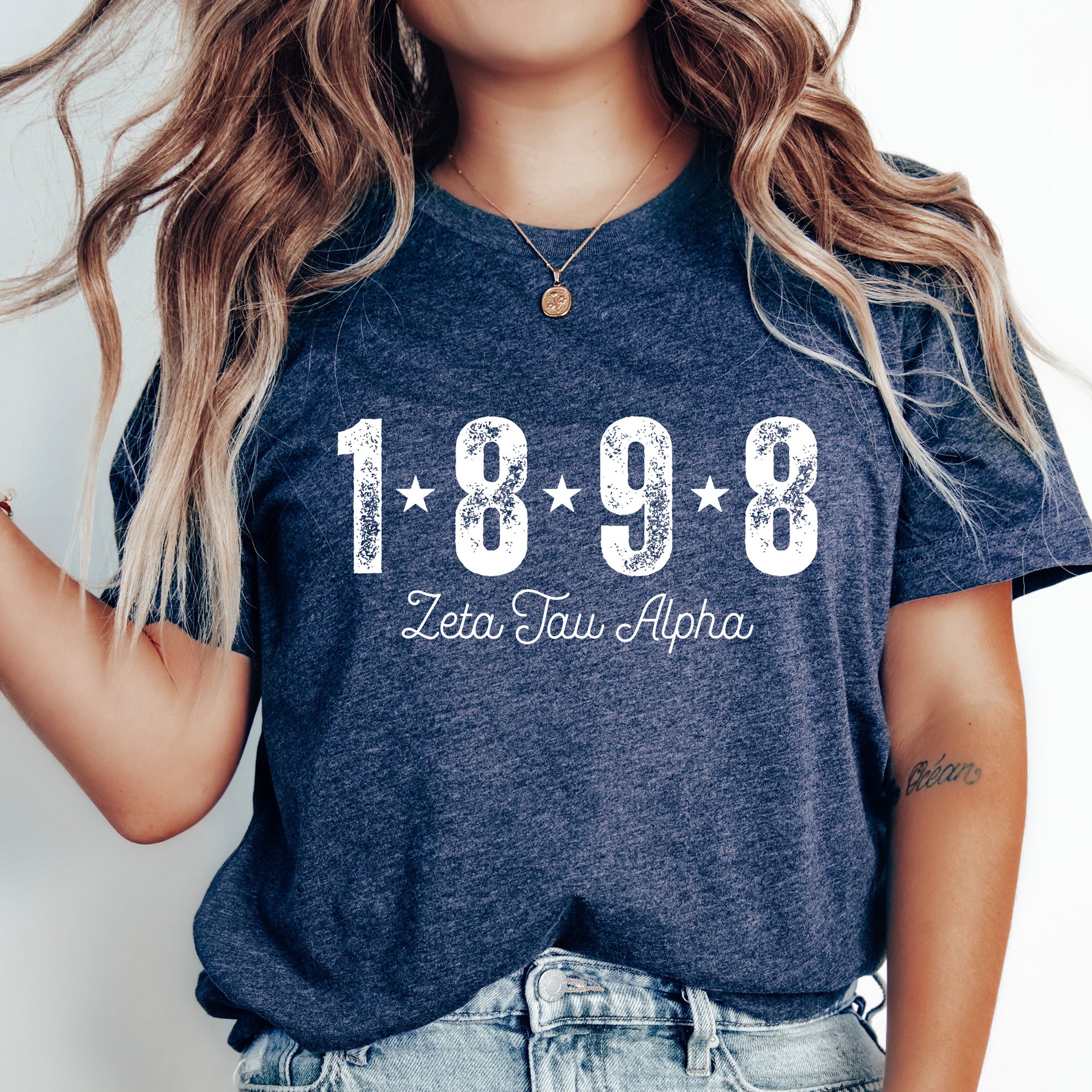 a woman wearing a t - shirt with the year 1989 printed on it