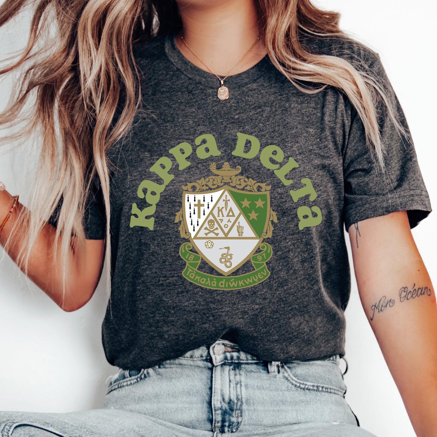 a woman with long hair wearing a harry potter shirt