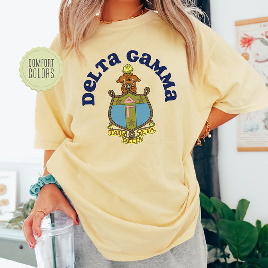 a woman in a yellow shirt is holding a drink