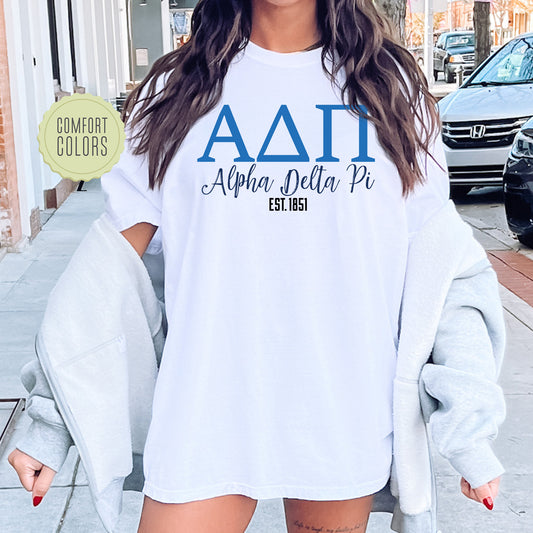 a woman wearing a white shirt and shorts