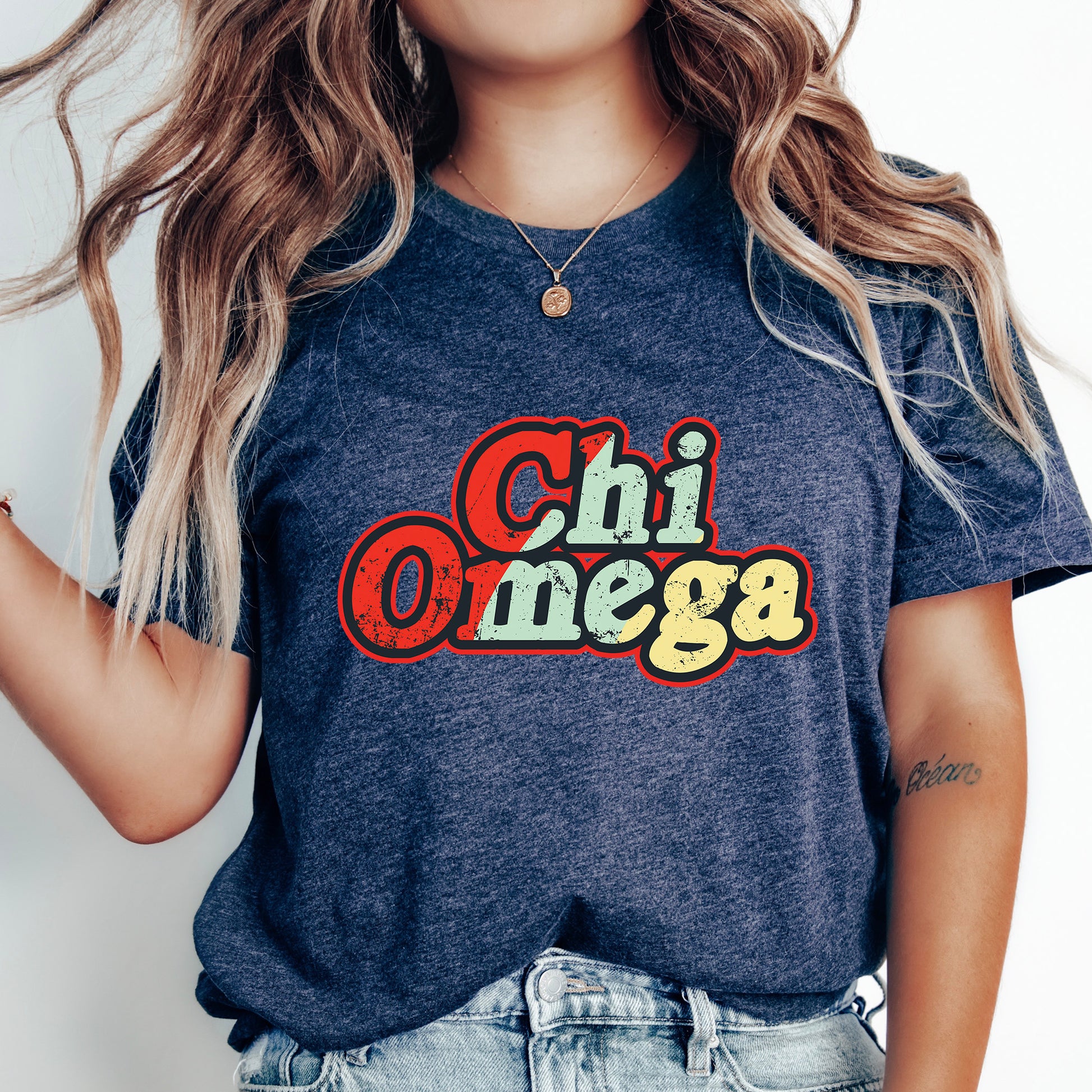 a woman wearing a t - shirt that says chi omega