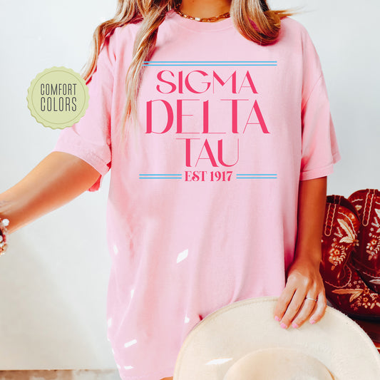 a woman wearing a pink shirt and hat