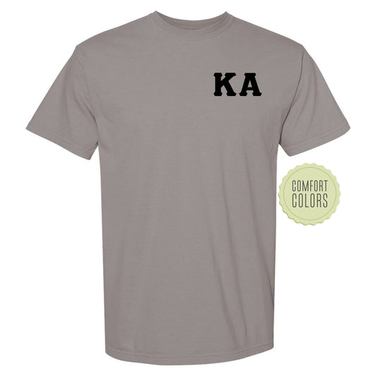 a gray t - shirt with the word ka printed on it