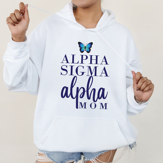 a woman wearing a white hoodie with a butterfly on it