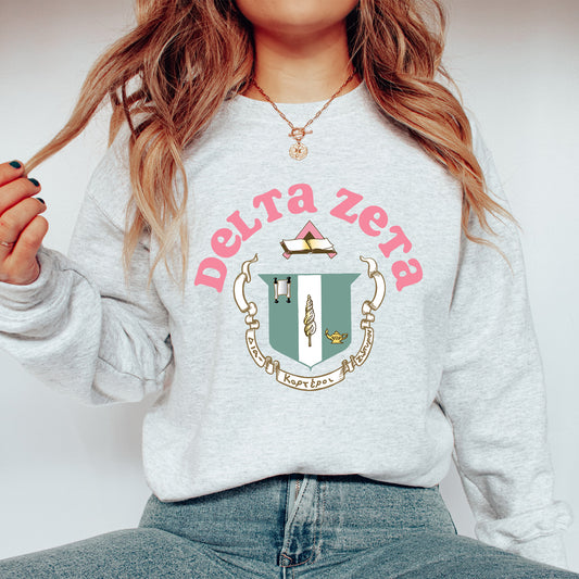 a woman wearing a sweatshirt with a crest on it