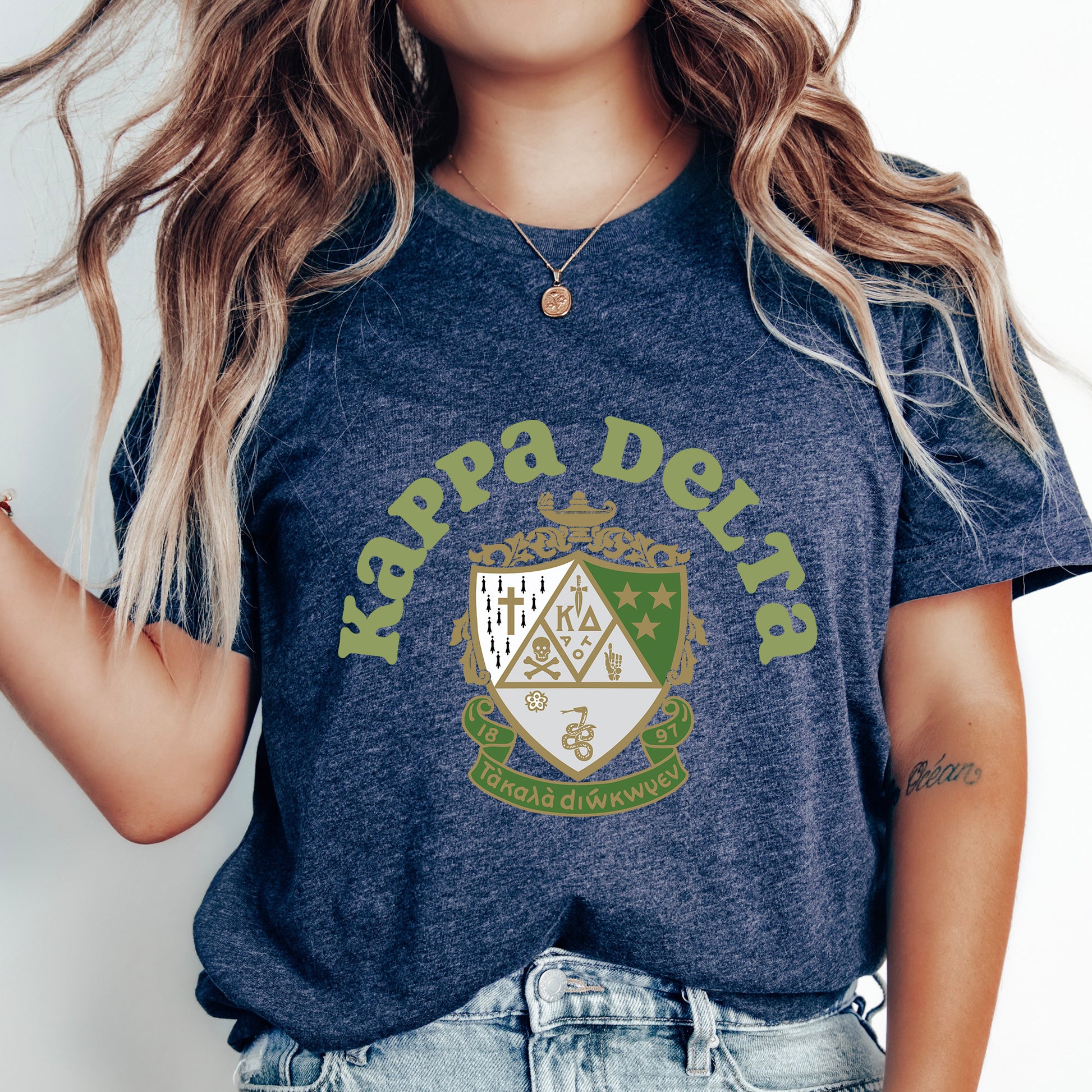 a woman with long hair wearing a harry potter shirt