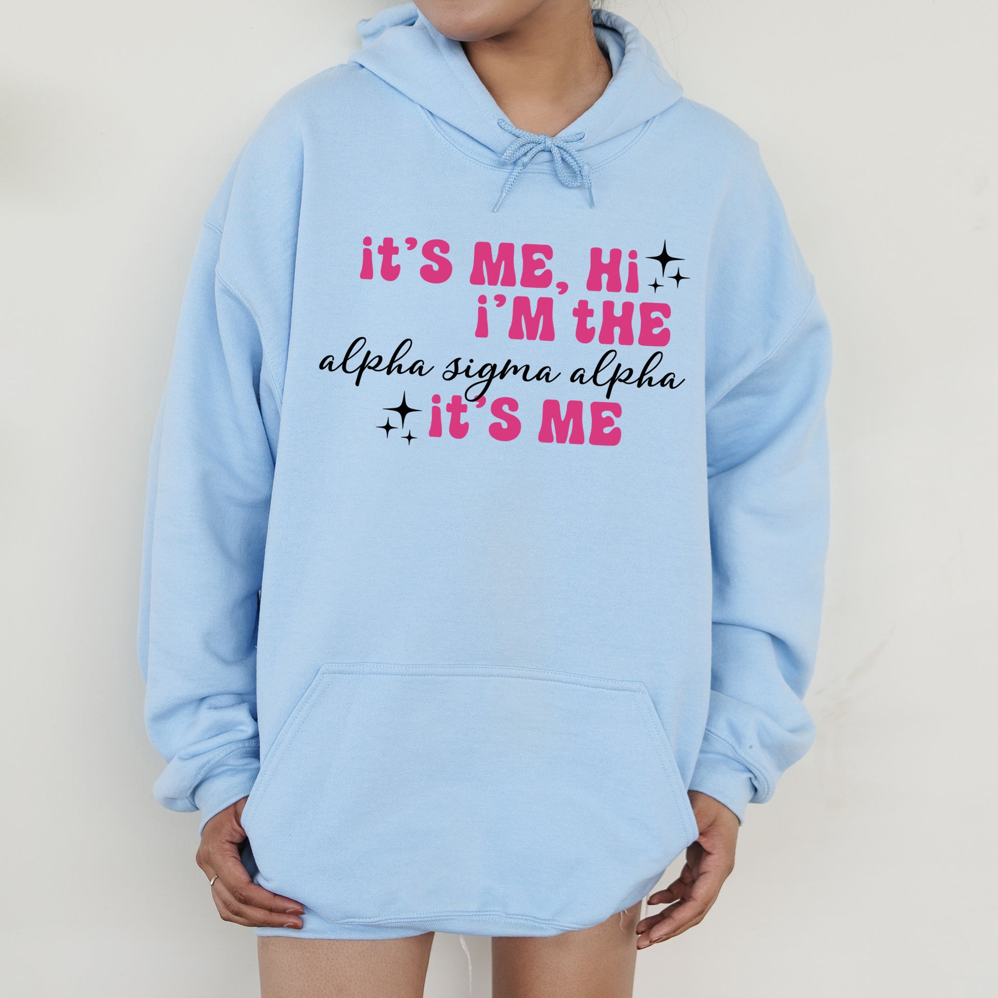a person wearing a blue hoodie that says it's me, i '