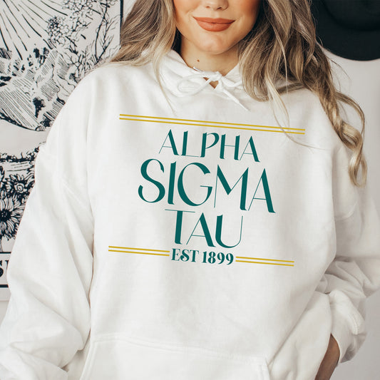 a woman wearing a white hoodie with a graphic on it