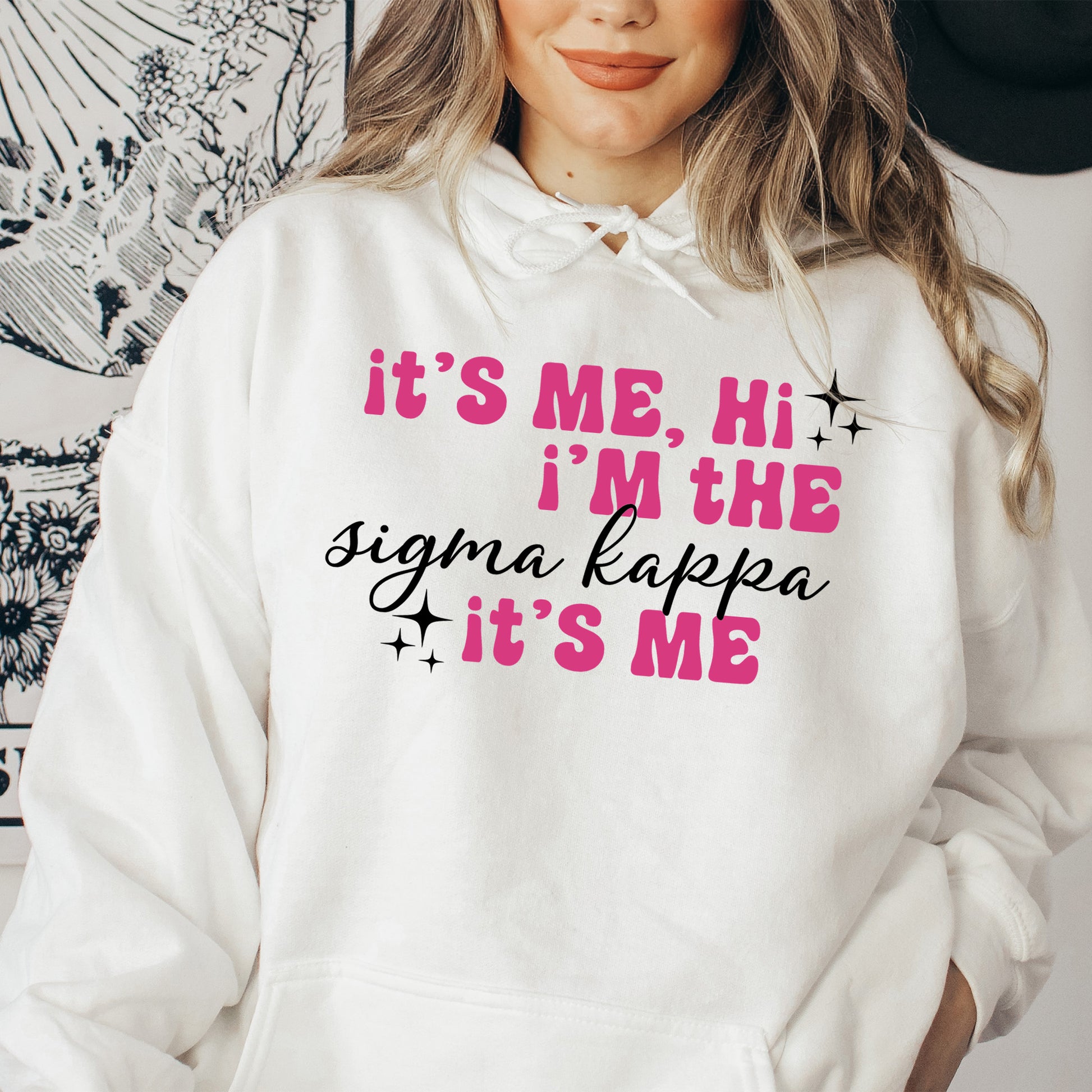 a woman wearing a white hoodie that says it's me, i '