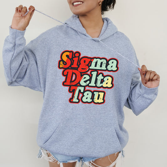 a woman wearing a blue sweatshirt with a slogan on it