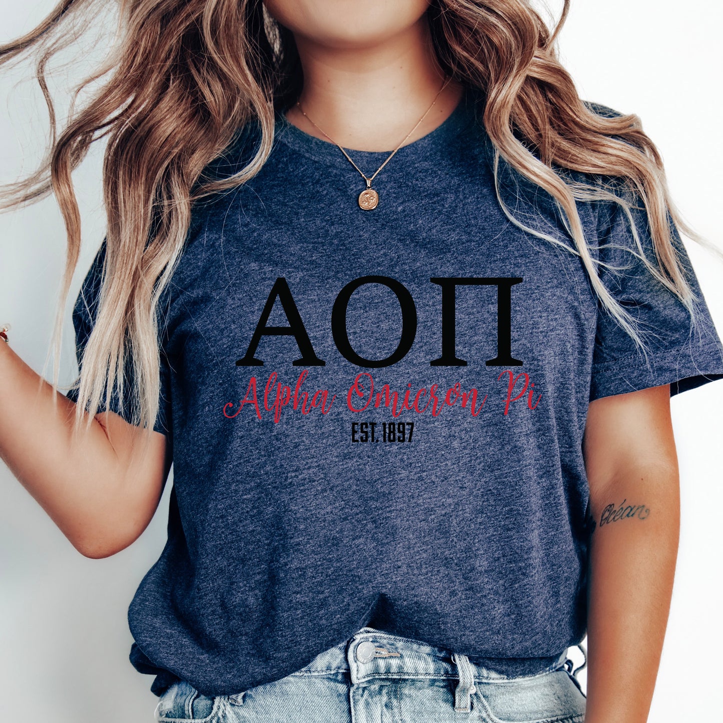 a woman wearing a t - shirt with the word aoi printed on it