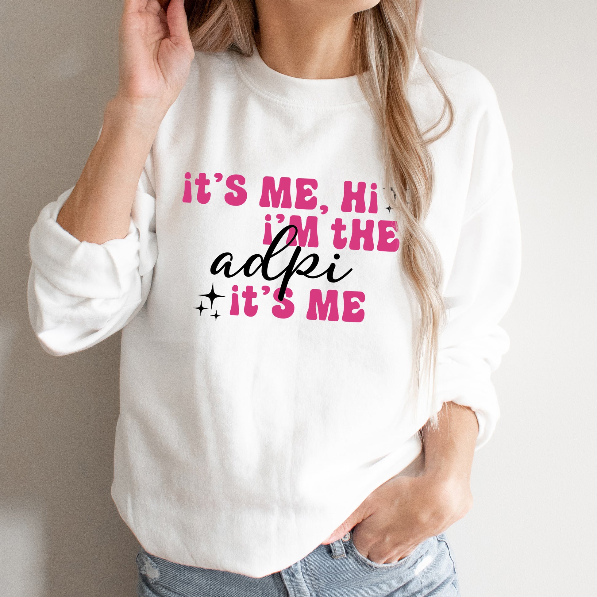 a woman wearing a sweatshirt that says it's me, i'm the