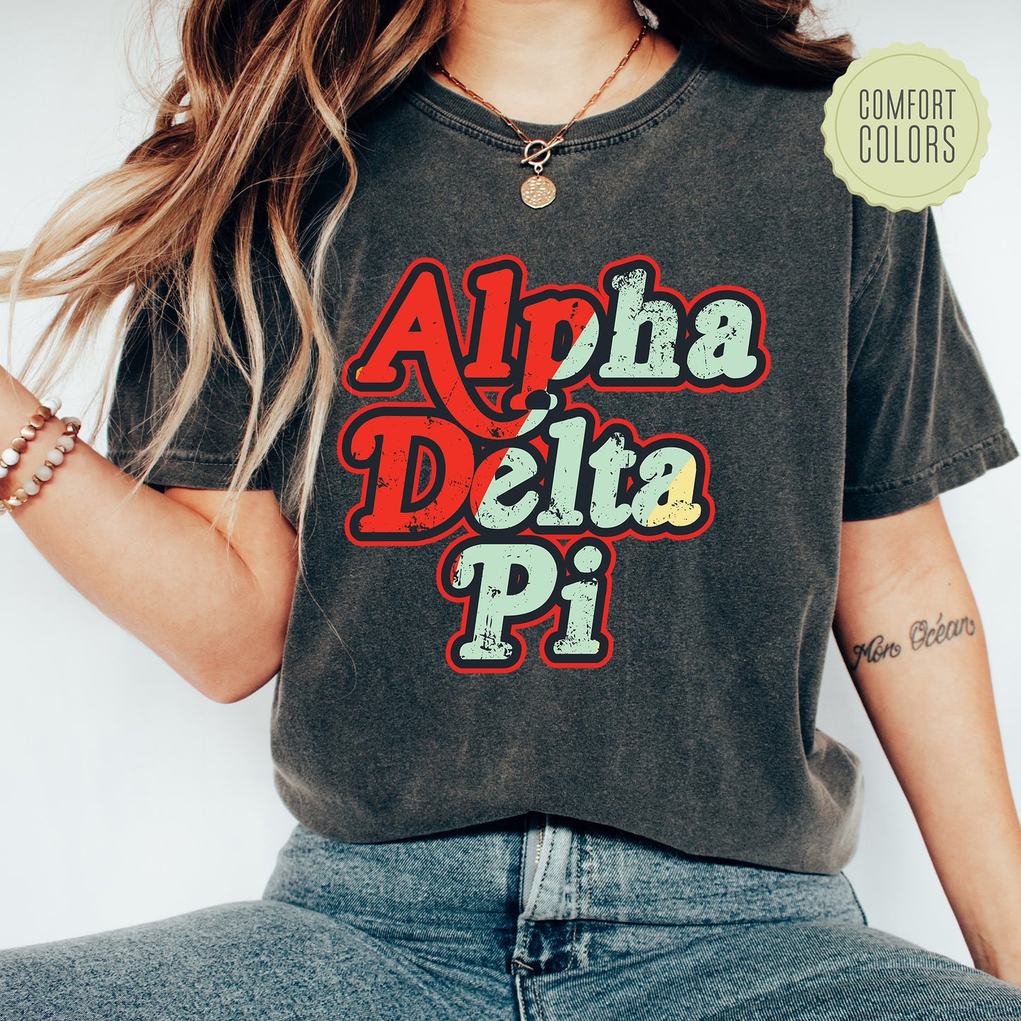 a woman wearing a shirt that says aloh delta pi