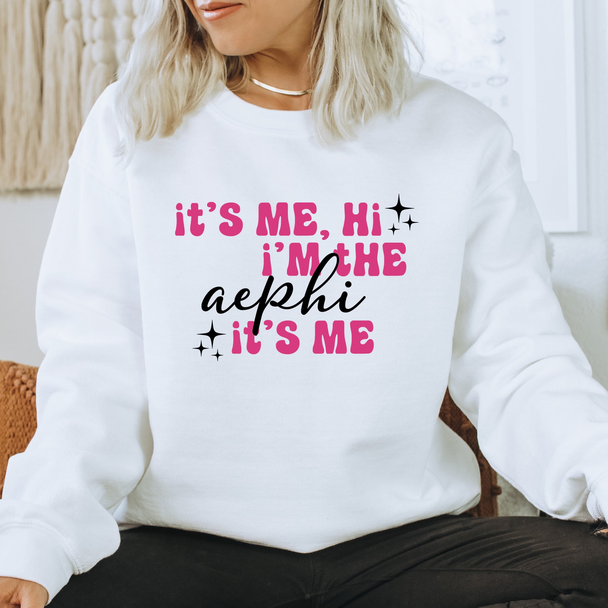 a woman wearing a sweatshirt that says it's me, i'm the