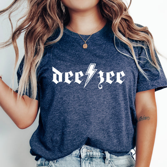 a woman wearing a tee shirt with a lightning bolt on it
