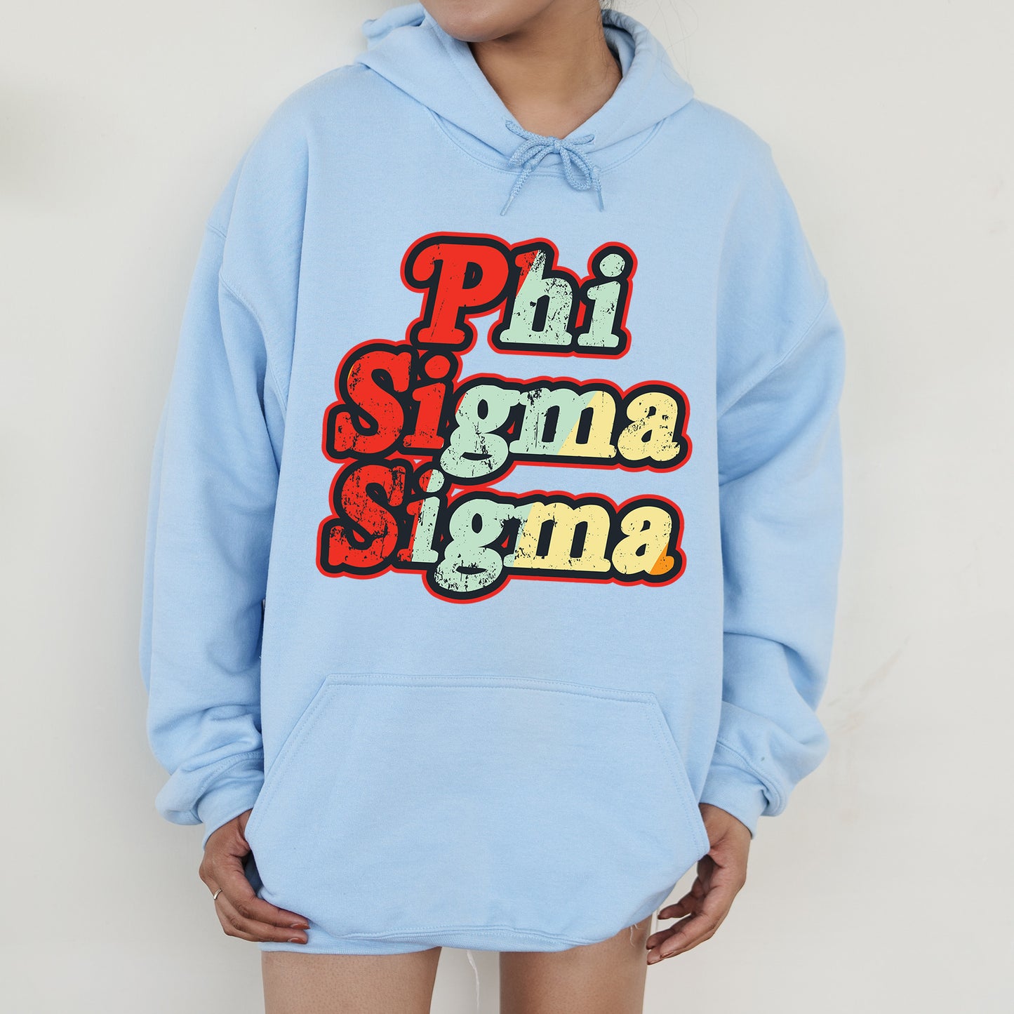 a person wearing a blue hoodie that says phi sigma sigma