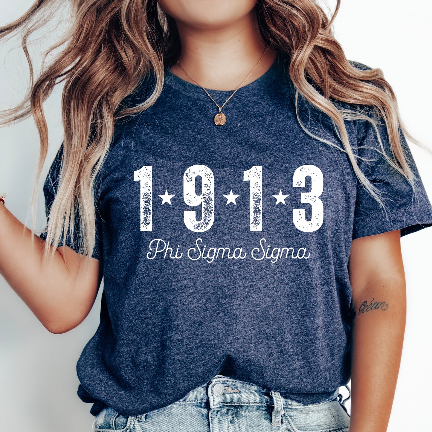 a woman wearing a t - shirt with the number 1911 printed on it