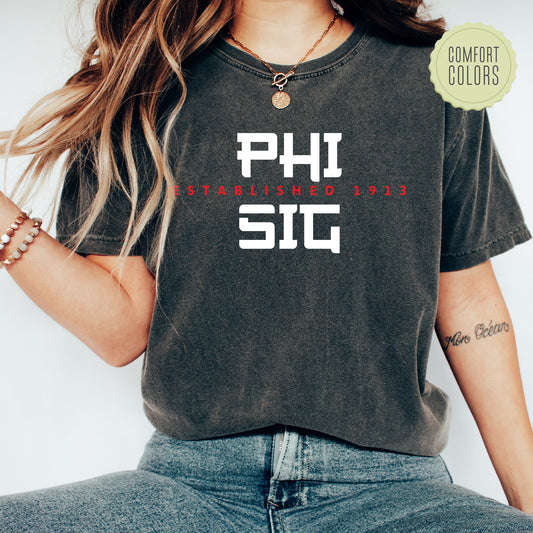a woman wearing a shirt that says phi sig