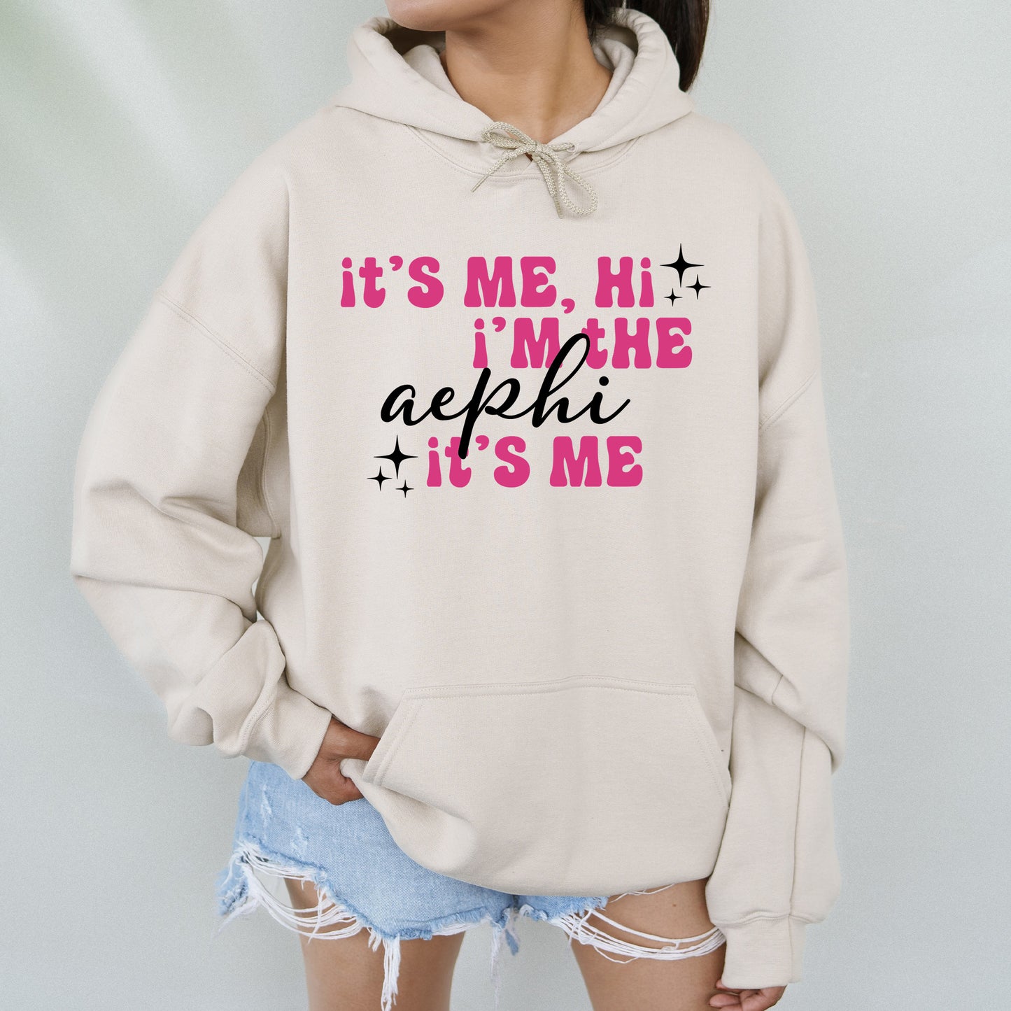 a woman wearing a sweatshirt that says it's me, i'm the