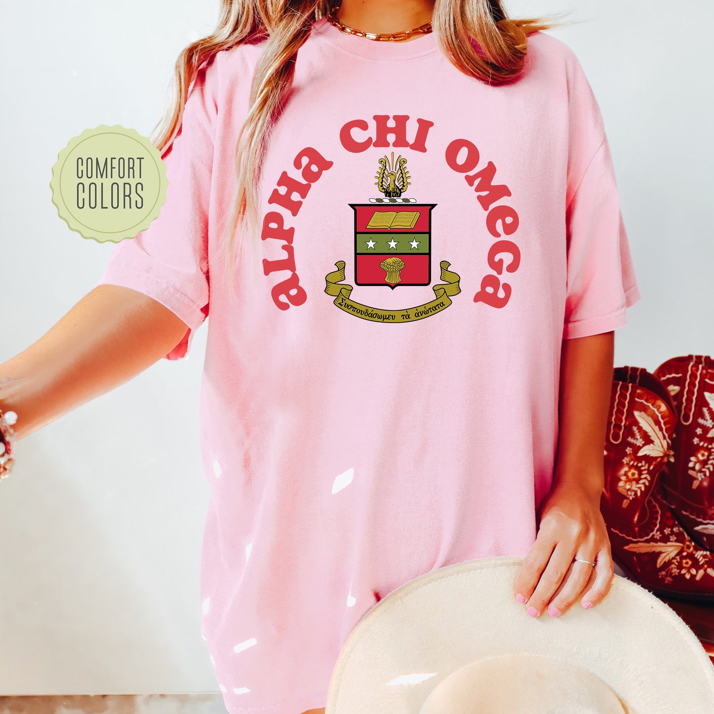 a woman wearing a pink shirt and hat