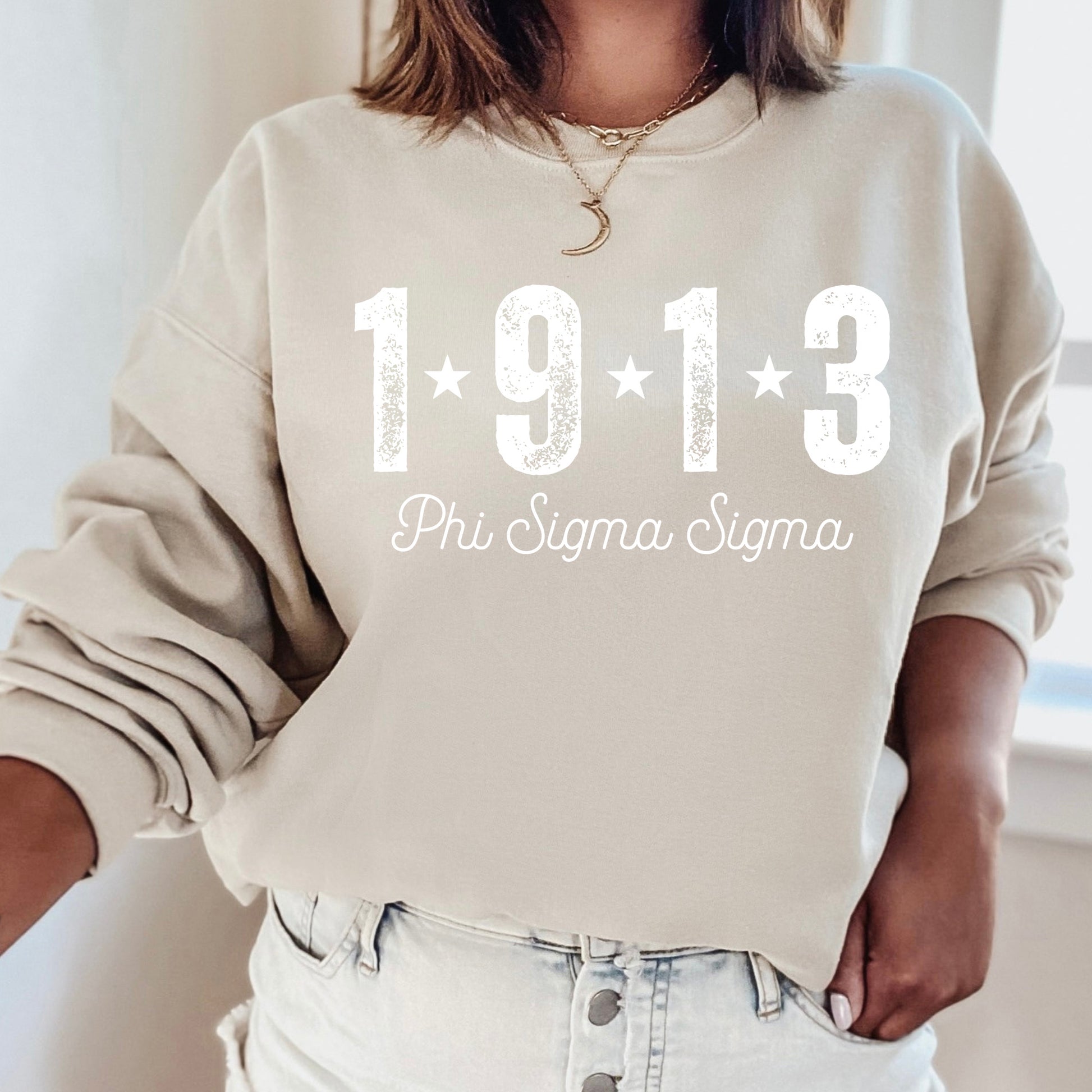 a woman wearing a sweatshirt that says 1911