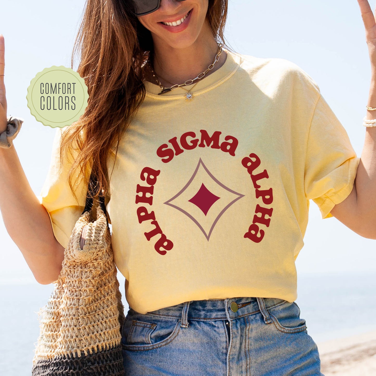 a woman wearing a t - shirt that says stigmaa bitch on it
