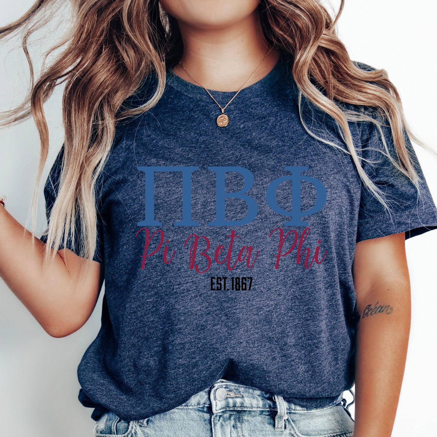 a woman with long hair wearing a t - shirt