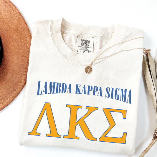 a hat and a t - shirt on a white surface