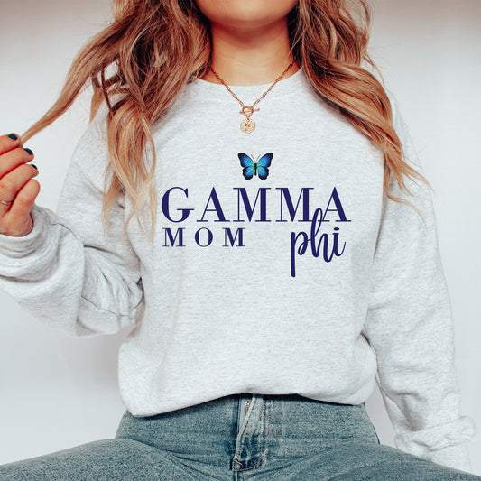 a woman wearing a sweatshirt with a butterfly on it