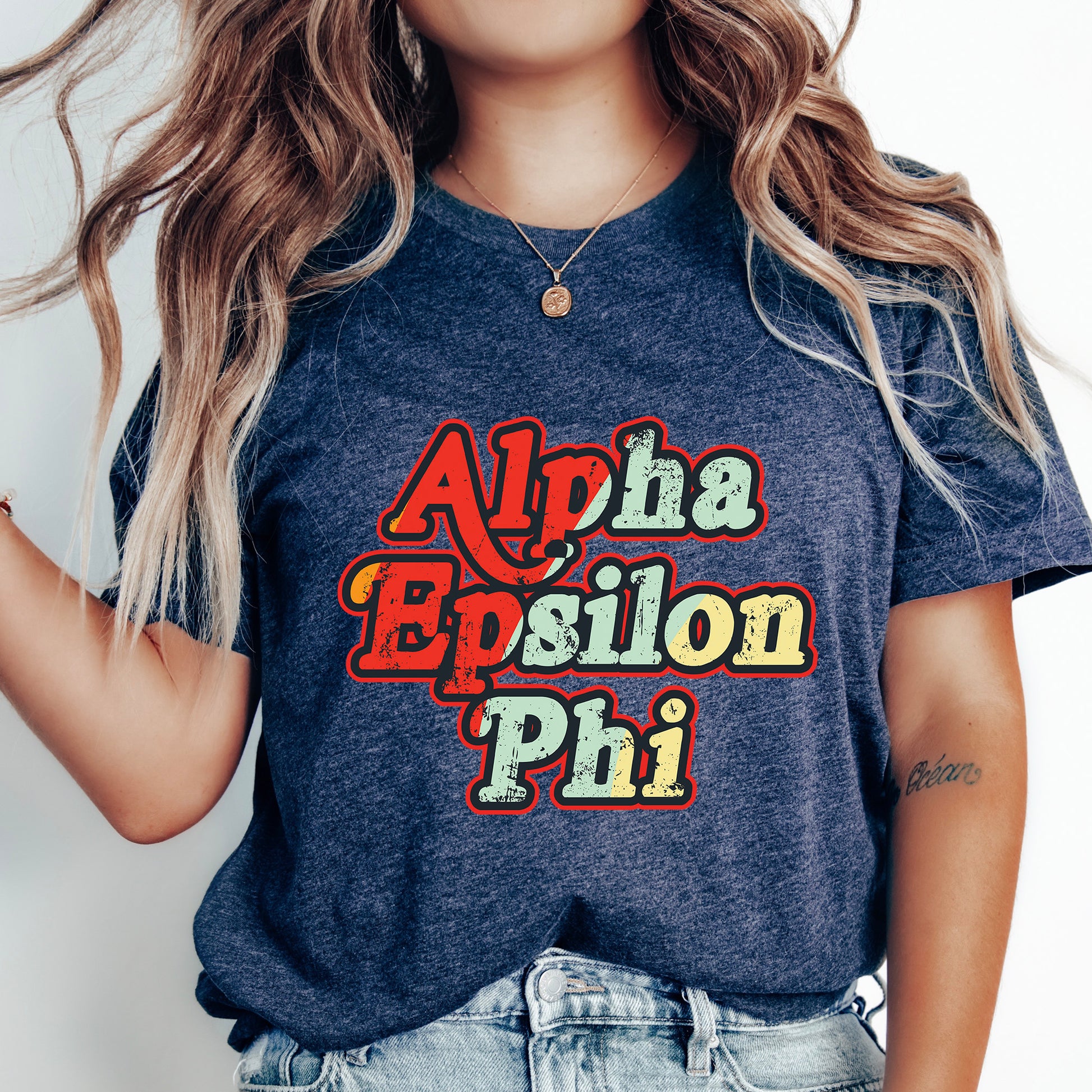 a woman with long hair wearing a shirt that says alpha epsilon phi