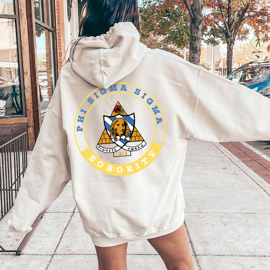 a woman in a white hoodie is walking down the street