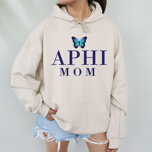 a woman wearing a sweatshirt with a butterfly on it