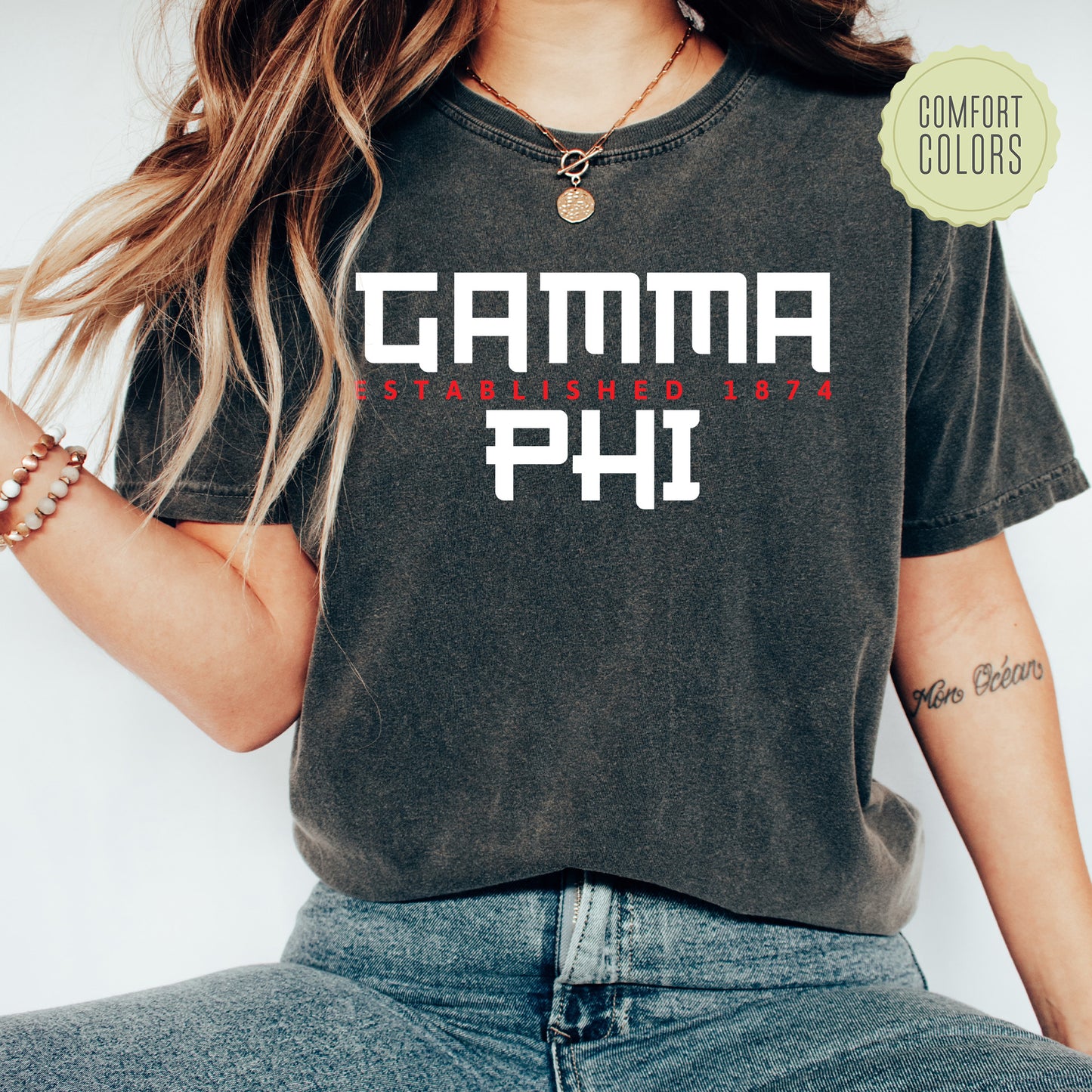 a woman wearing a t - shirt that says garma ph