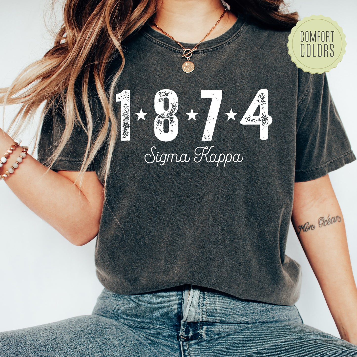 a woman wearing a t - shirt with the number 1974 printed on it