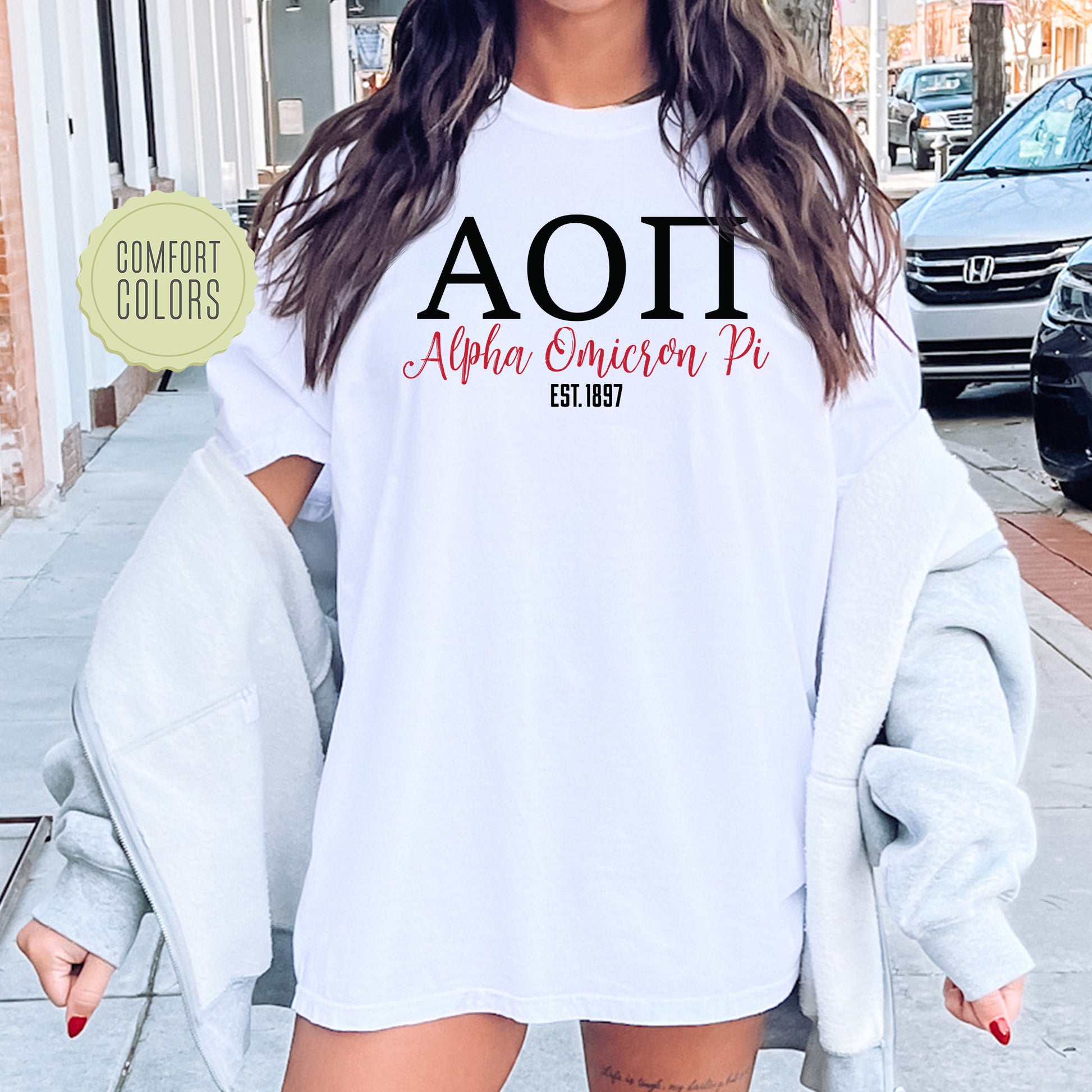 a woman wearing a white shirt with the word aoi on it
