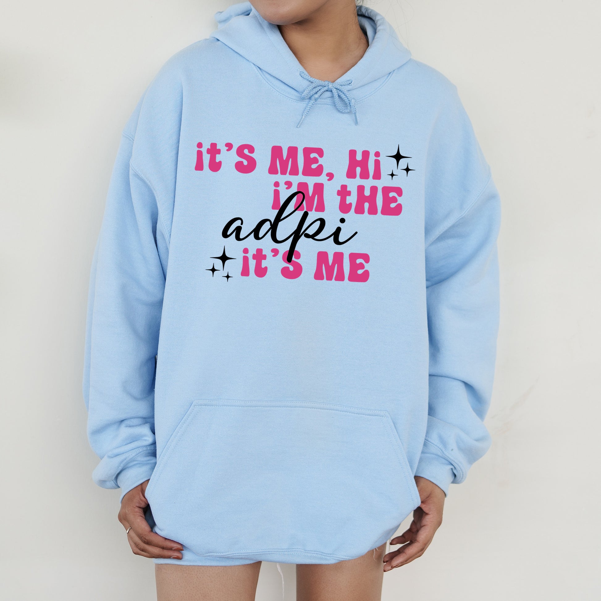 a person wearing a blue hoodie that says it's me, i '