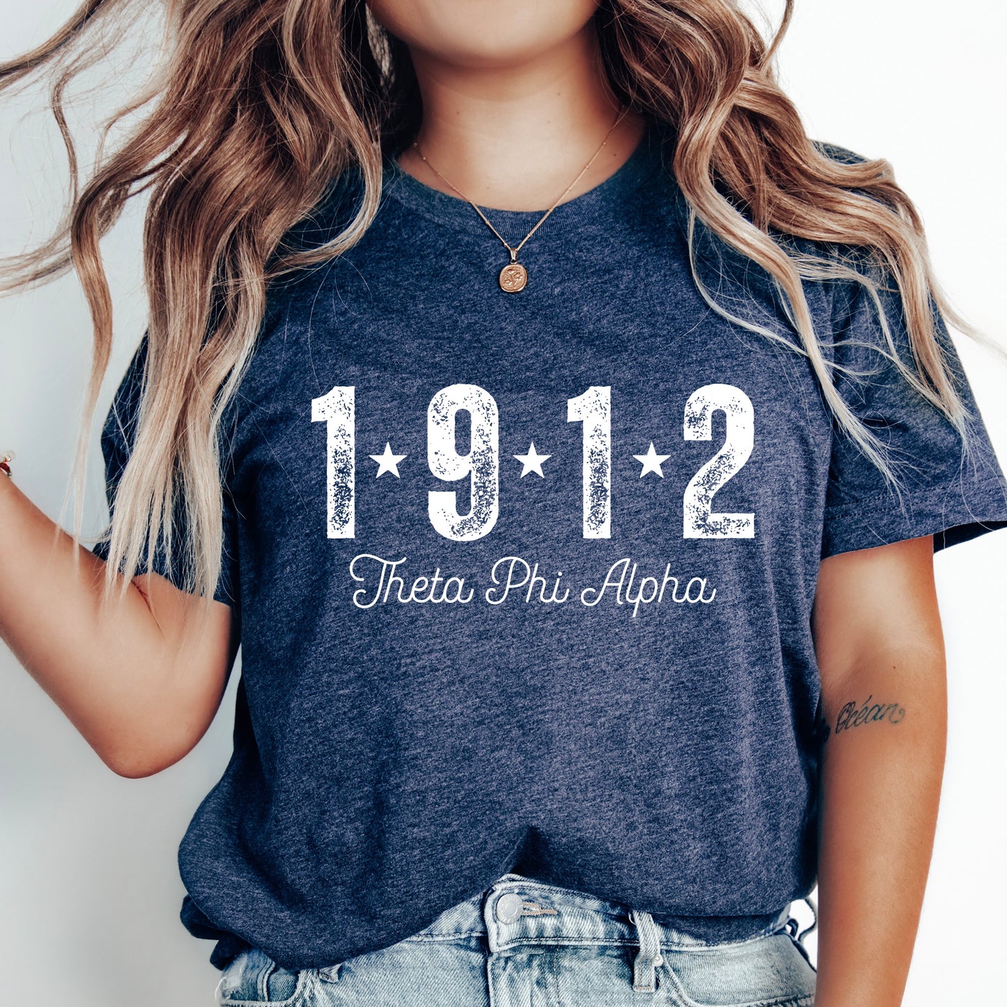a woman wearing a t - shirt with the number 1911 printed on it