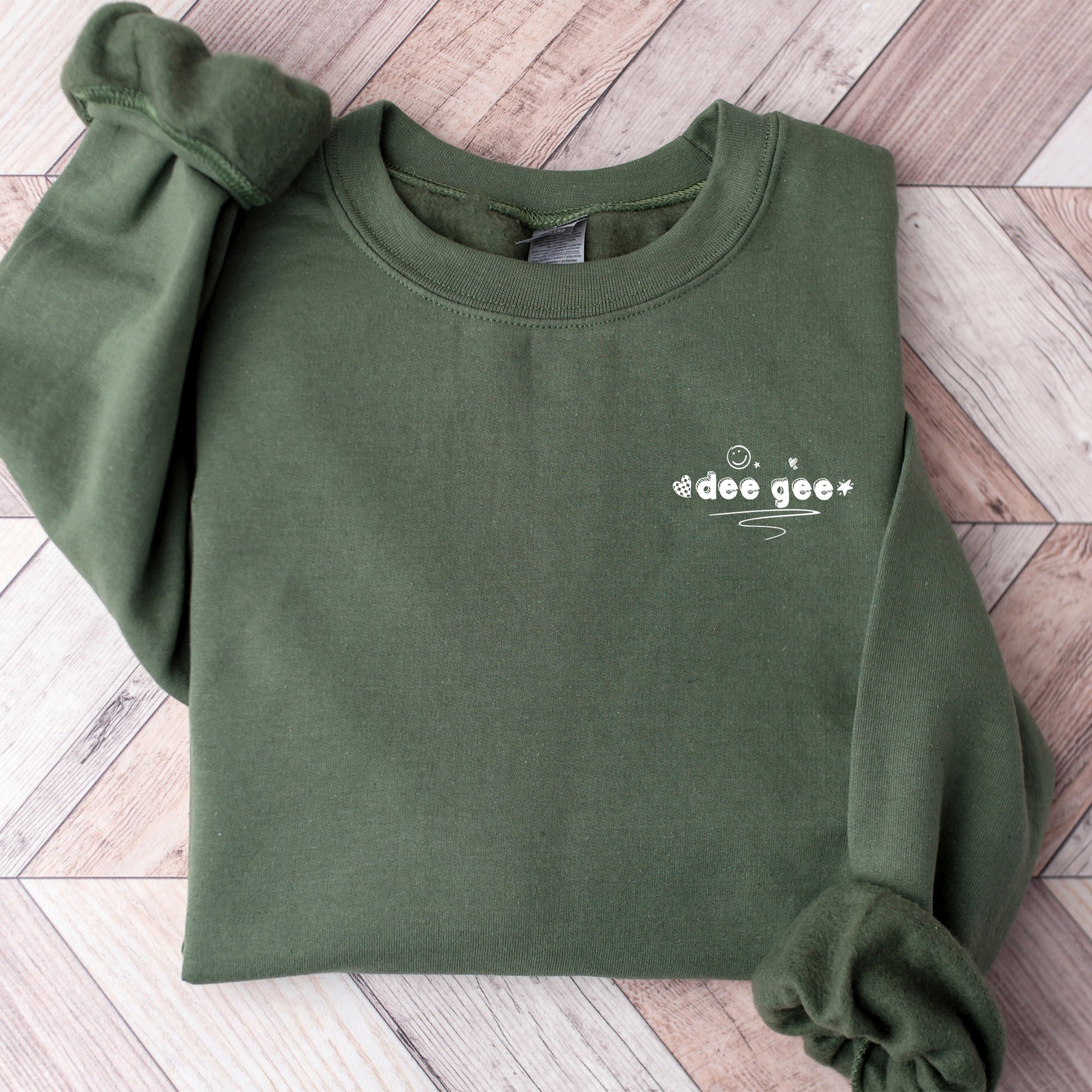 a green sweatshirt with the words do good written on it