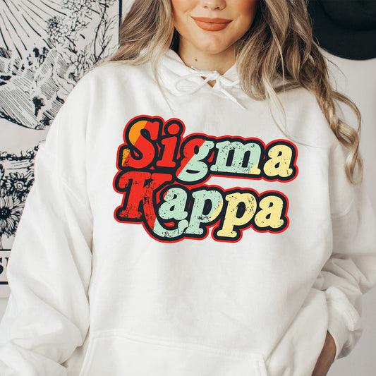 a woman wearing a white hoodie that says singma rappa