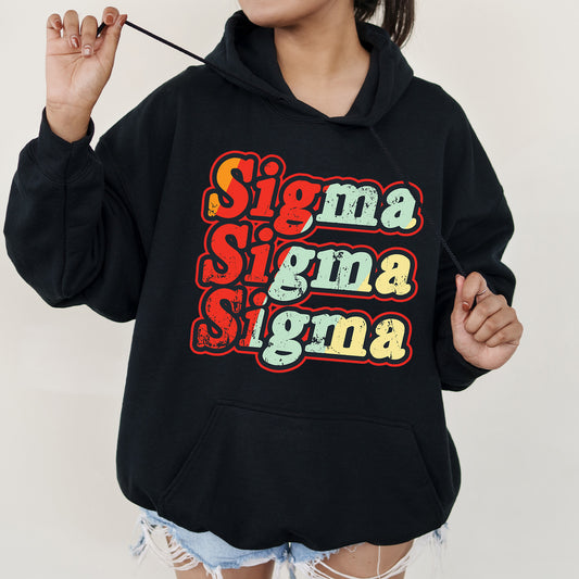 a woman wearing a black hoodie with the words singma singma on it
