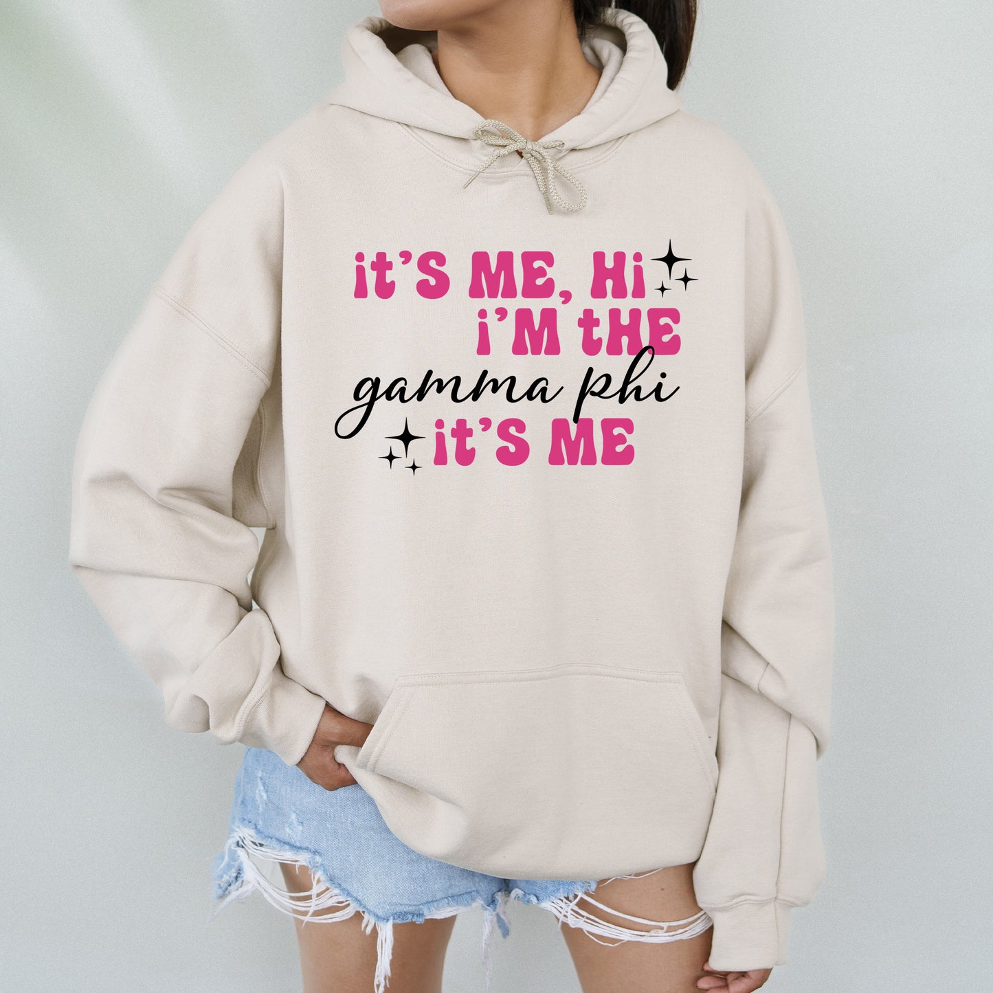 a woman wearing a sweatshirt that says it's me, i'm the