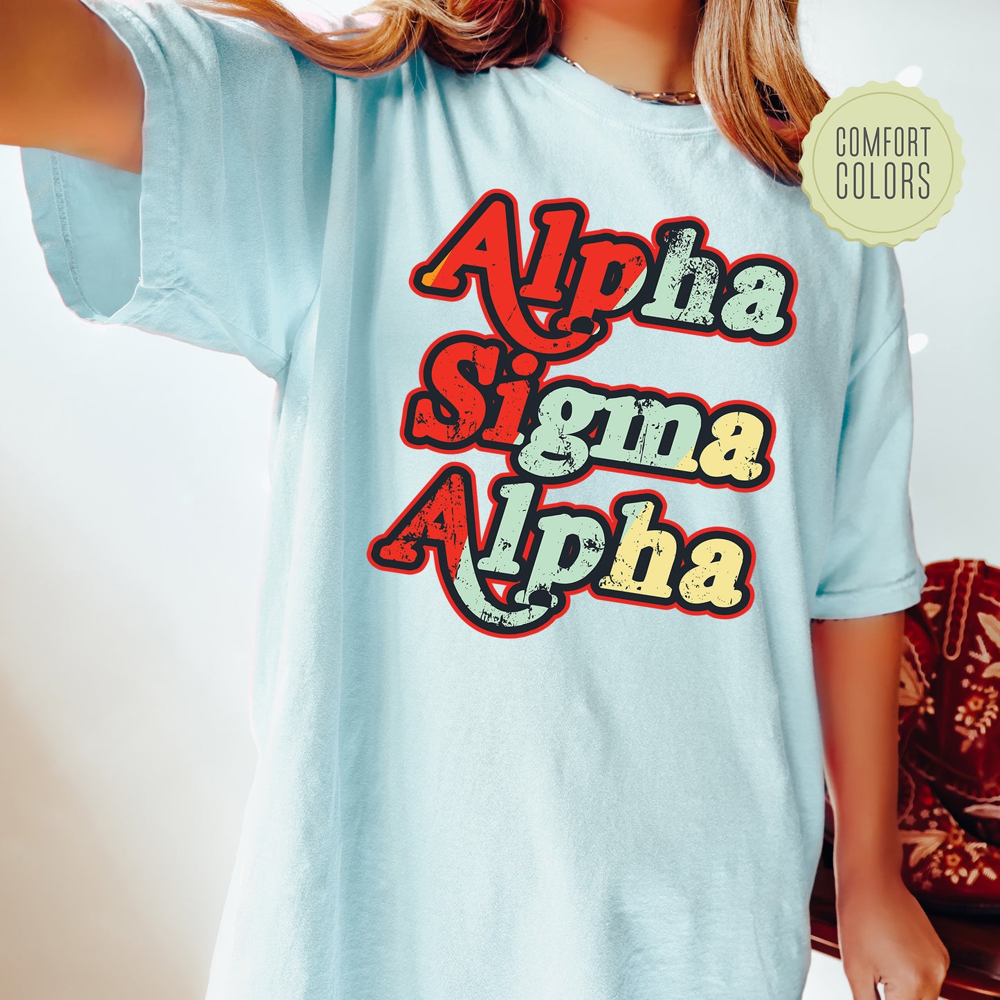 a woman wearing a light blue shirt with the words, ah ah, ah ah